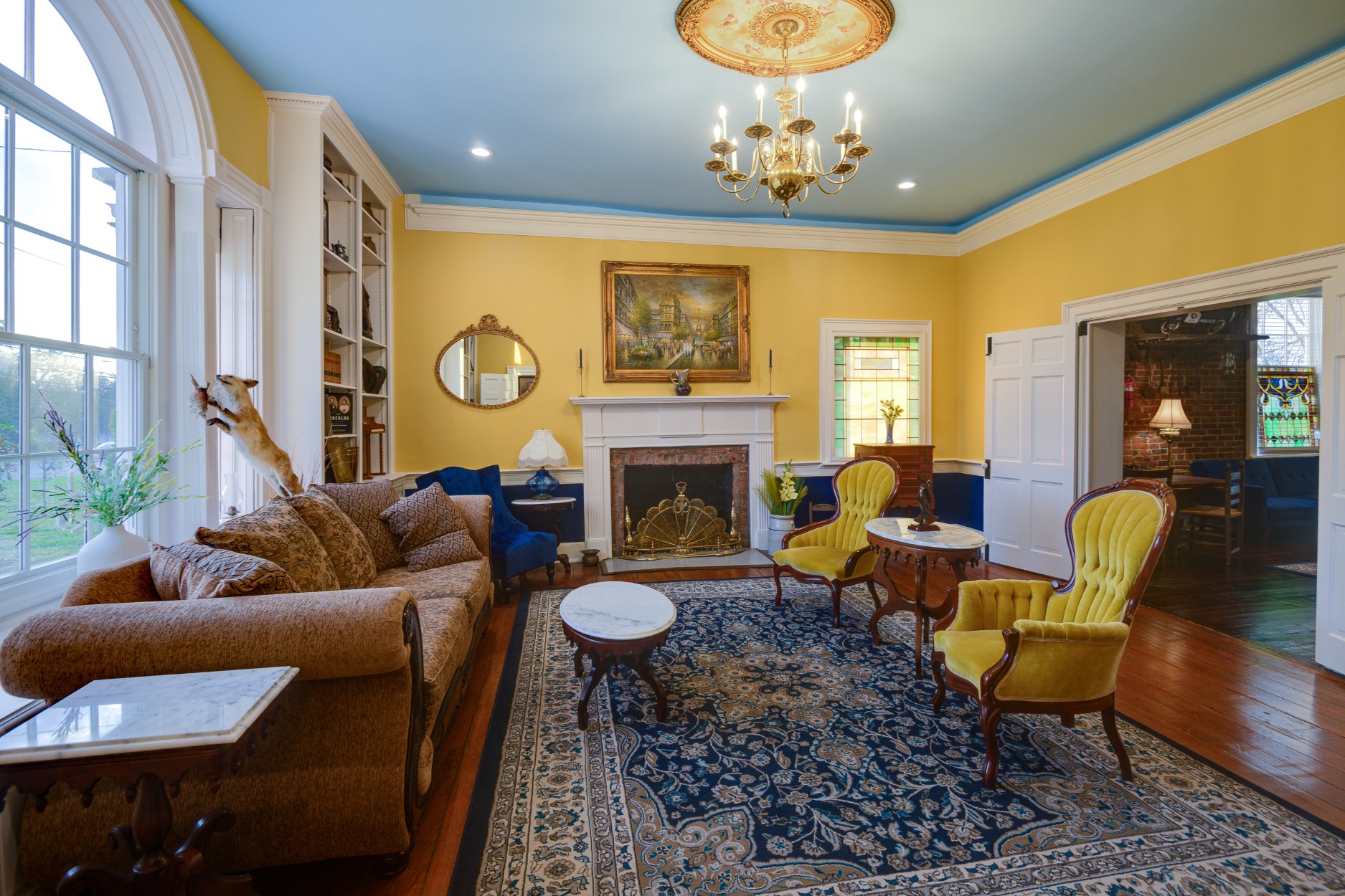 The grand entrance and formal parlor of Blythewood Manor